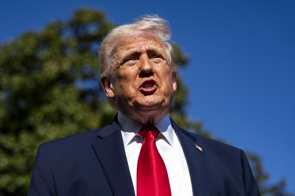 epa12884152 US President Donald Trump speaks to the media before departing the White House en route to Miami, Florida, in Washington, DC, USA, 11 April 2026. EPA/BONNIE CASH / POOL