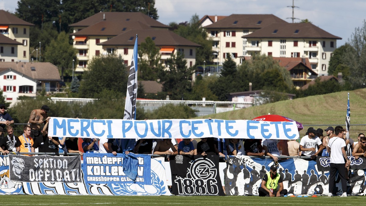 Grasshopper's supporters hold a banner writing "Merci pour cette fete" (english: Thank your for this party), during the Swiss Cup Round of 64 between CS Romontois and Grasshopper Club Z ...