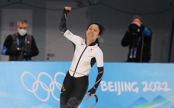 epa09765265 Miho Takagi of Japan reacts during the Women&#039;s Speed Skating 1000m event at the Beijing 2022 Olympic Games, Beijing, China, 17 February 2022. EPA/JEROME FAVRE