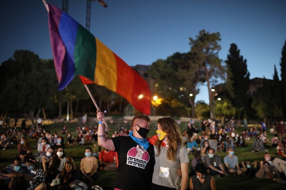 epa08514728 People take part in a rally in support of the LGBT (lesbian, gay, bisexual, transgender) community in Jerusalem, Israel, 28 June 2020. The rally took place in several cities across the cou ...