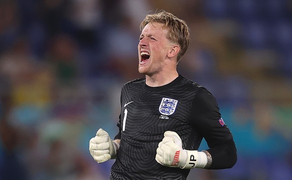 epa09321336 England goalkeeper Jordan Pickford celebrates his team&#039;s 2-0 lead during the UEFA EURO 2020 quarter final match between Ukraine and England in Rome, Italy, 03 July 2021. EPA/Mike Hewi ...