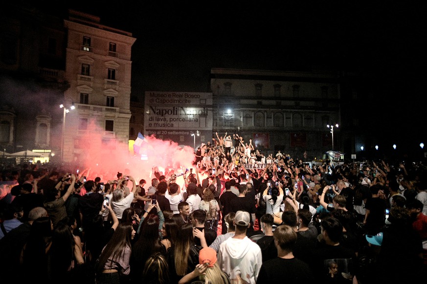 Napoli fans celebrate their team&#039;s win over Juventus in the Italian Cup soccer final against Juventus, in Naples, Italy, Wednesday, June 17, 2020. Napoli won the Italian Cup with a 4-2 penalty sh ...