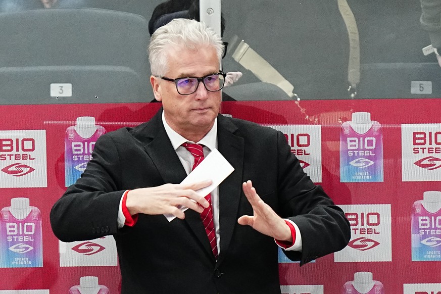 Austria&#039;s head coach Roger Bader gestures during the group A match between Austria and Germany at the ice hockey world championship in Tampere, Finland, Friday, May 19, 2023. (AP Photo/Pavel Golo ...