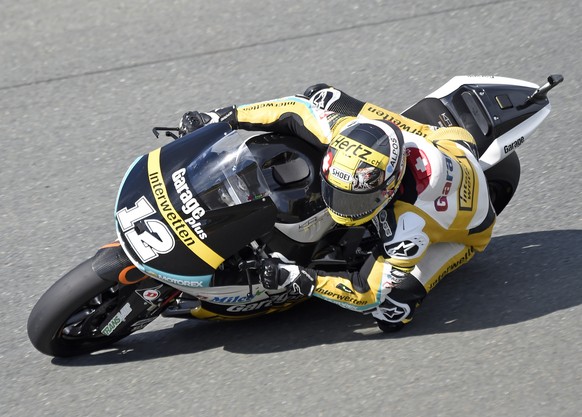 Kalex rider Thomas Luethi of Switzerland speeds up during the MotoGP free practice at the Sachsenring circuit in Hohenstein-Ernstthal, Germany, Saturday, July 11, 2015. The Motorcycle Grand Prix of Ge ...