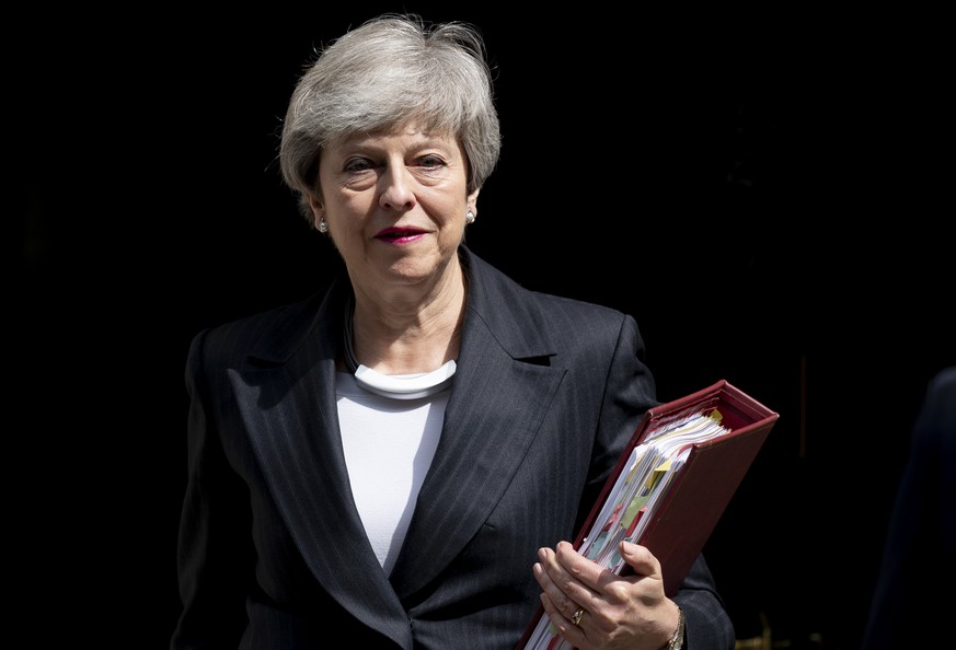 epa07591467 British Prime Minister Theresa May leaves 10 Downing Street to attend Prime Minister&#039;s Questions (PMQs) in the central London, Britain, 22 May 2019. Theresa May in a speech on 22 May  ...