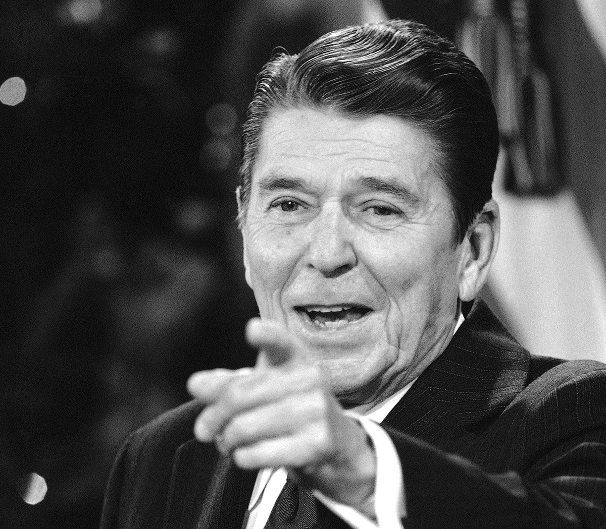 FILE - This Dec. 17, 1981 file photo shows President Ronald Reagan pointing to a reporter for the next question during his news conference in the East Room at the White House in Washington. About the  ...