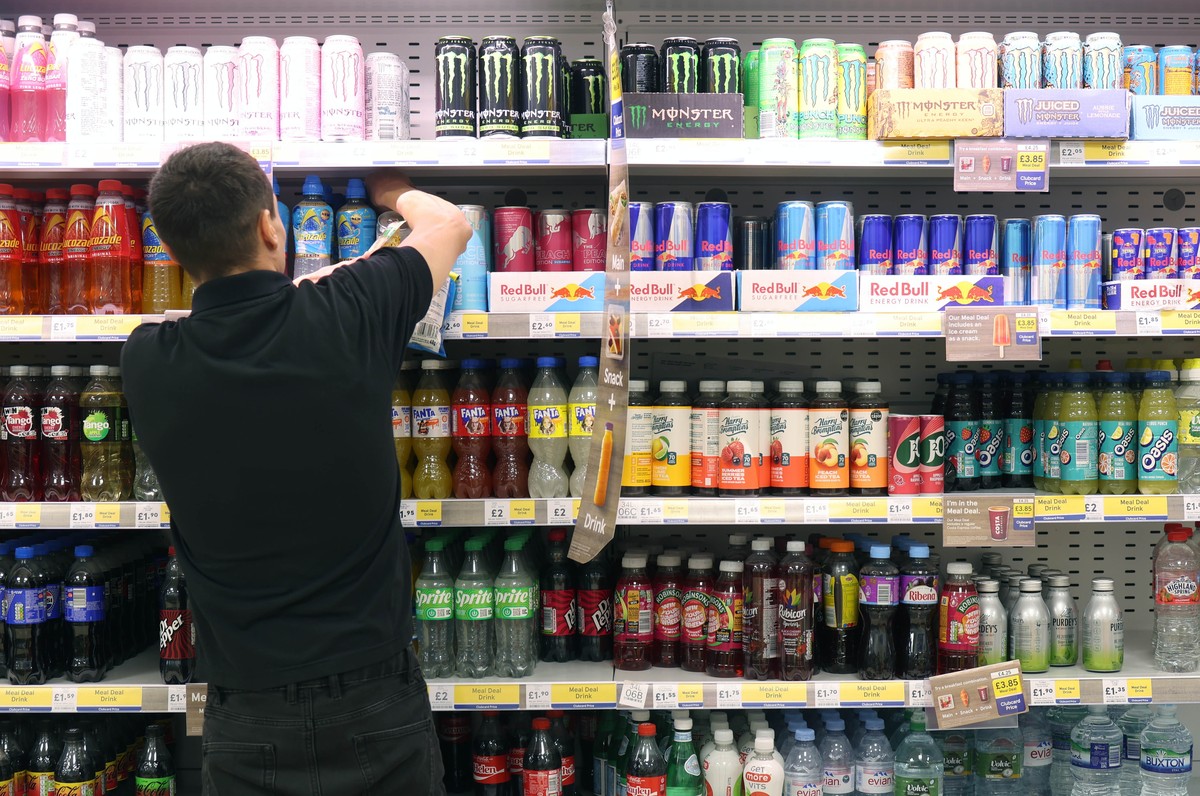 epa12349434 Energy drinks displayed on a supermarket shelf in London, Britain, 03 September 2025. The UK government is planning new legislation in England to prevent people under 16 from buying energy ...