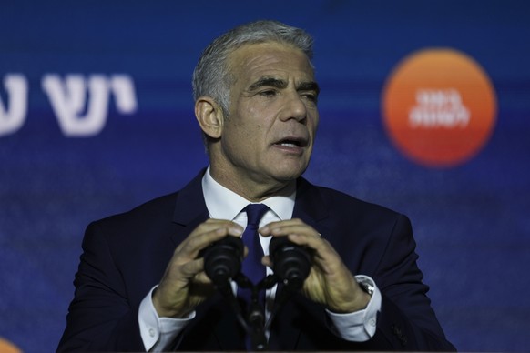 Israeli Prime Minister and the head of Yesh Atid party, Yair Lapid, speaks to his supporters after first exit poll results for the Israeli Parliamentary election at his party&#039;s headquarters in Te ...