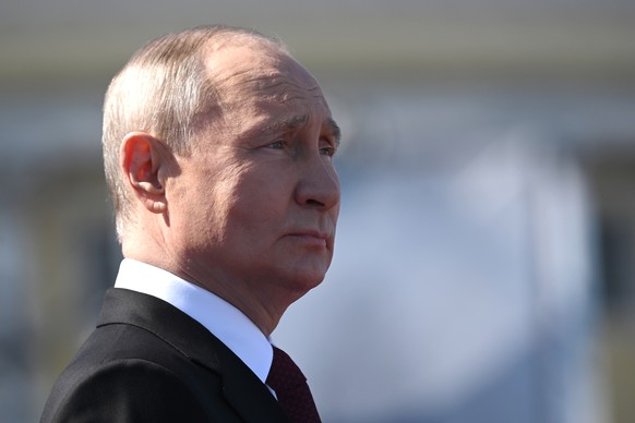 Russian President Vladimir Putin delivers his speech prior to the main naval parade marking Russian Navy Day in St. Petersburg, Russia, Sunday, July 30, 2023. (Alexander Kazakov, Sputnik, Kremlin Pool ...