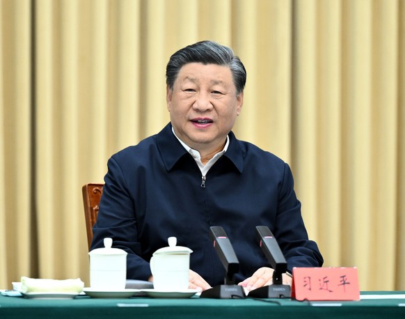 epa10821794 Chinese President Xi Jinping, also general secretary of the Communist Party of China Central Committee and chairman of the Central Military Commission, delivers a speech when he is briefed ...