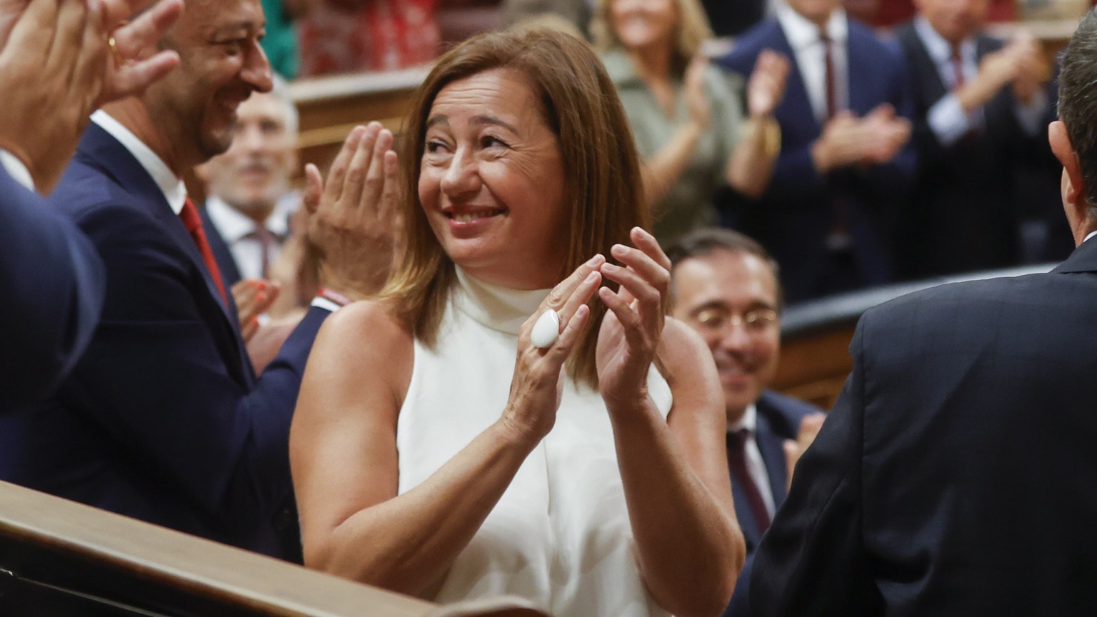 epa10803861 Socialist MP Francina Armengol (C) celebrates after being chosen as Speaker of the Lower House during the Constitutive Session of the Lower House for the 15th legislature in Madrid, Spain, ...