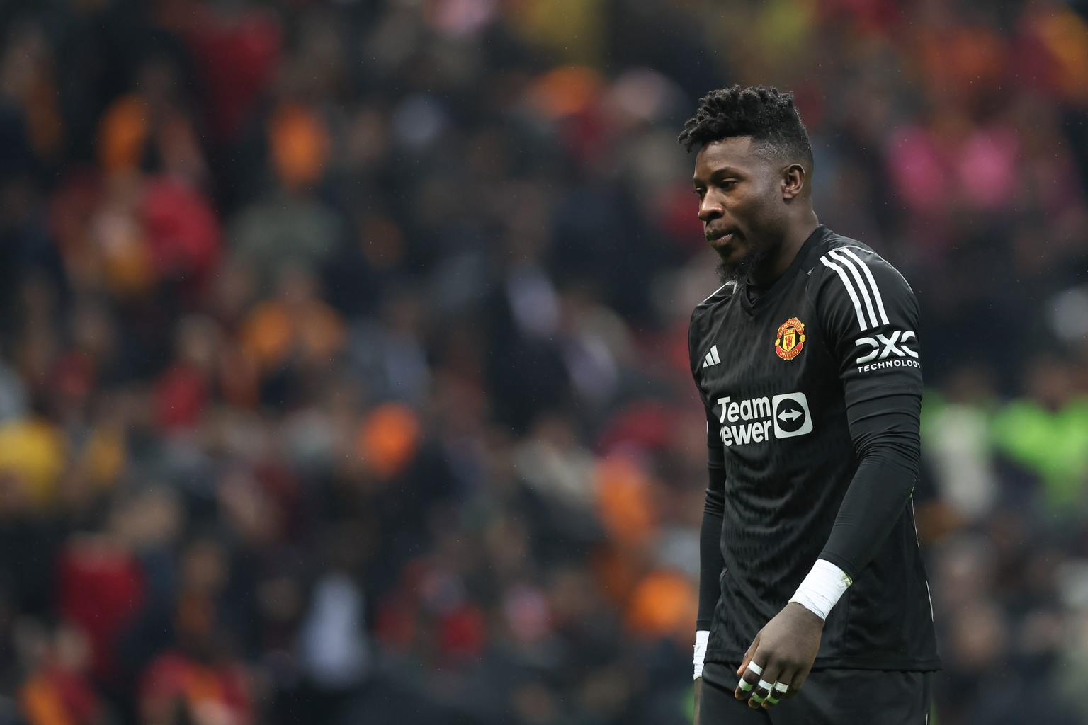 epa11002043 Manchester United&#039;s goalkeeper Andre Onana reacts after the UEFA Champions League group A soccer match between Galatasaray SK and Manchester United in Istanbul, Turkey, 29 November 20 ...