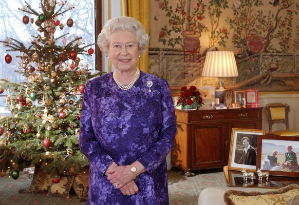 LONDON - DECEMBER 2004: (EMBARGOED: NOT FOR PUBLICATION BEFORE 0001 LOCAL TIME DECEMBER 25, 2004 - NO UK SALES FOR 28 DAYS). In this pool picture taken, December 15, 2004, Queen Elizabeth II records h ...