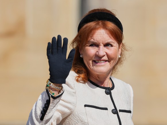 FILE - Sarah Ferguson waves the to the crowd was she attends the Easter Matins Service at St. George&#039;s Chapel, Windsor Castle, England, on April 20, 2025. (AP Photo/Kirsty Wigglesworth, Pool, Fil ...