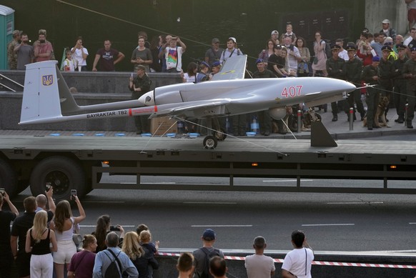 FILE - A Turkish-made Bayraktar TB2 drone is seen during a rehearsal of a military parade dedicated to Independence Day in Kyiv, Ukraine, Friday, Aug. 20, 2021. The Russian invasion of Ukraine is the  ...