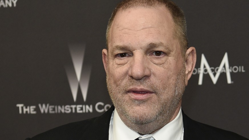 FILE - In this Jan. 8, 2017, file photo, Harvey Weinstein arrives at The Weinstein Company and Netflix Golden Globes afterparty in Beverly Hills, Calif. A former personal assistant for Harvey Weinstei ...