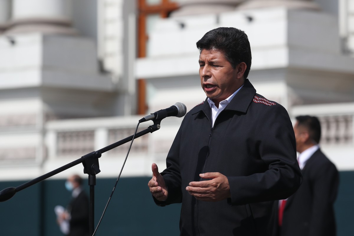 epa09872635 The president of Peru, Pedro Castillo, speaks to the press in the framework of a meeting with political and congressional spokesmen, in Lima, Peru, 05 April 2022. Castillo met this 05 Apri ...