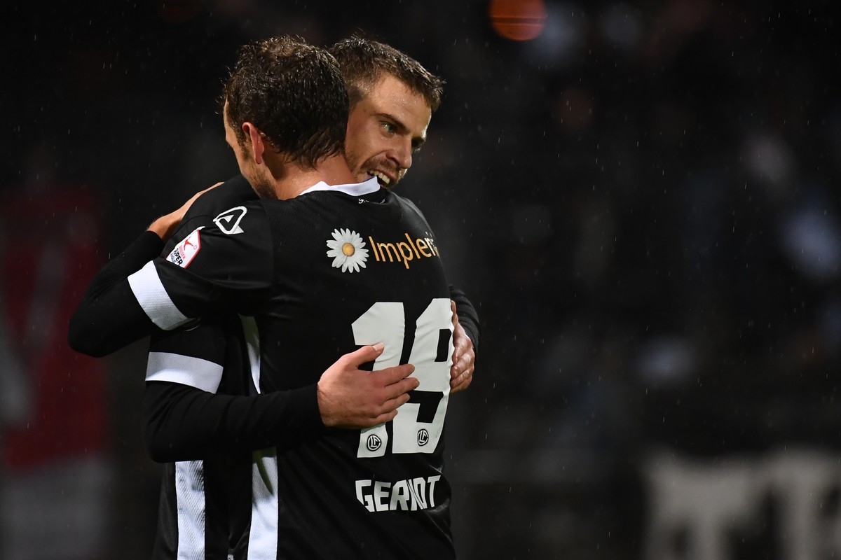 Lugano's player Alexander Gerndt, left, and Lugano's player Domen Crnigoj, right, celebrate the 1-0 goal during the Swiss Cup Round of 16 between FC Lugano and Neuchatel Xamax, at the Coranr ...