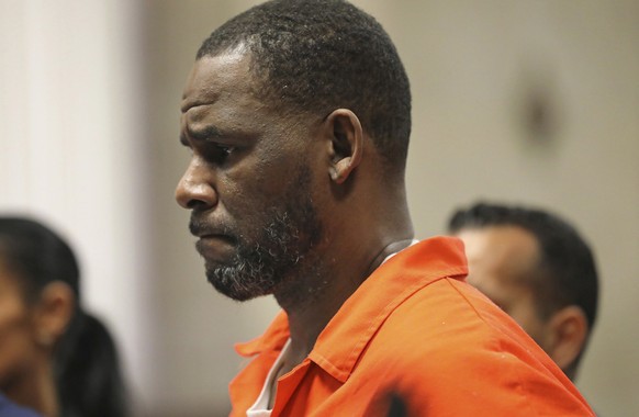 FILE - In this Sept. 17, 2019, file photo, R. Kelly appears during a hearing at the Leighton Criminal Courthouse in Chicago. Attorneys for R. Kelly want to question a convicted member of the Latin Kin ...