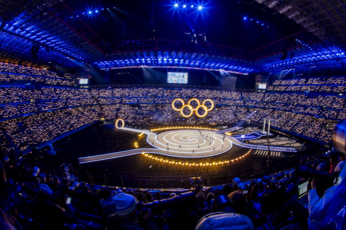 Wipe effect due to long time exposure shows the artists performing, during the Opening Ceremony at the 2026 Olympic Winter Games in the San Siro stadium, in Milan, Italy, on Friday, February 6, 2026.  ...