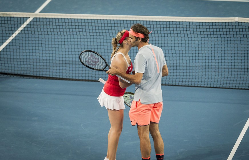 epa05695454 Belinda Bencic and Roger Federer of Switzerland during the mixed doubles match between Great Britain and Switzerland in session 4 of the Hopman Cup at the Arena in Perth, Australia, 02 Jan ...