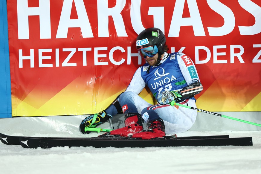 epa11859223 Rasmus Windingstad of Norway on the ground at the finish area during the Men&#039;s Giant Slalom race at the FIS Alpine Skiing World Cup in Schladming, Austria, 28 January 2025. EPA/ANNA S ...