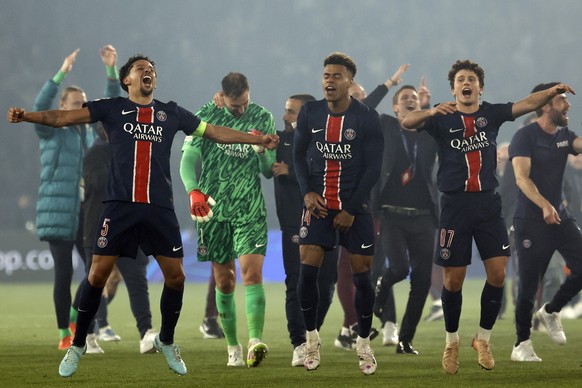 epa12082144 PSG players celebrate with supporters after winning the UEFA Champions League semi-finals 2nd leg soccer match between Paris Saint-Germain and Arsenal FC, in Paris, France, 07 May 2025. EP ...