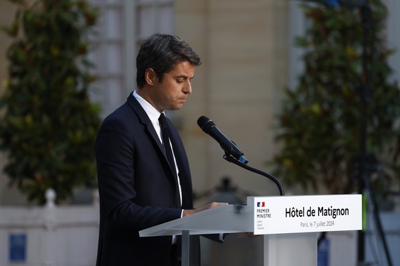 French Prime Minister Gabriel Attal delivers a speech after the second round of the legislative elections, Sunday, July 7, 2024 in Paris. A coalition of the French left that quickly banded together to ...