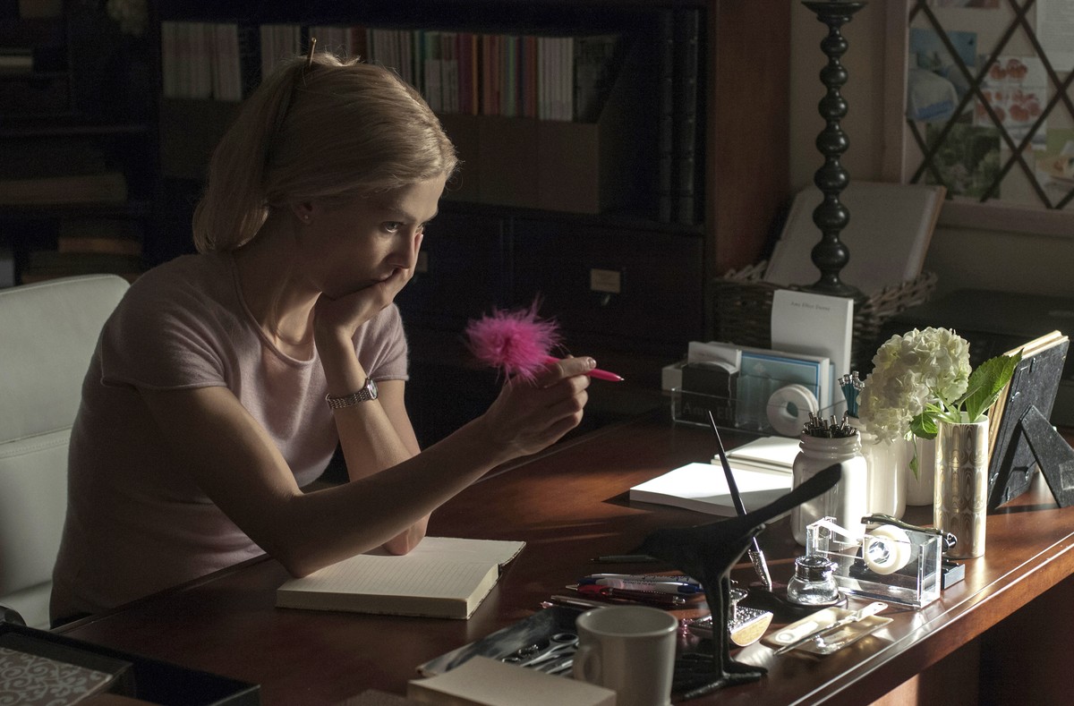 In this image released by 20th Century Fox, Rosamund Pike appears in a scene from "Gone Girl." The film, based on the best-selling novel, will release on Oct. 3. (AP Photo/20th Century Fox,  ...