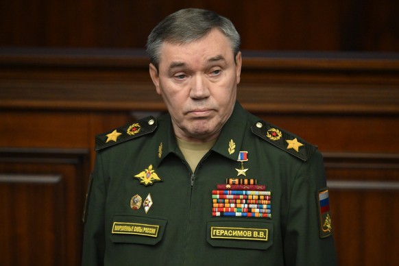 epa11780738 Chief of the General Staff of the Armed Forces of the Russian Federation Valery Gerasimov attends an expanded meeting of the Defence Ministry Board at the National Defence Control Centre i ...