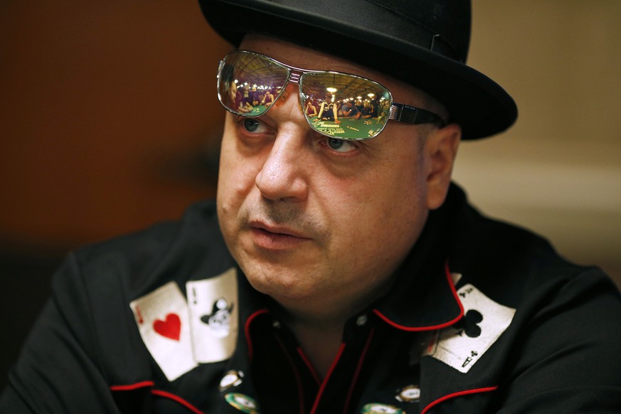 Professional poker player Jeffrey Lisandro competes during the main event at the World Series of Poker Wednesday, July 8, 2015, in Las Vegas. Lisandro is among over 4,000 players who remain in the Las ...