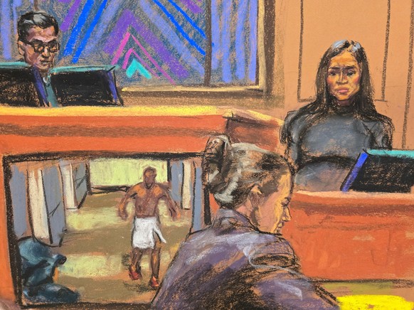 Sean &quot;Diddy&quot; Combs (not seen) listens as his former girlfriend Casandra &quot;Cassie&quot; Ventura testifies as a video from a hotel is played at his sex trafficking trial in New York City,  ...