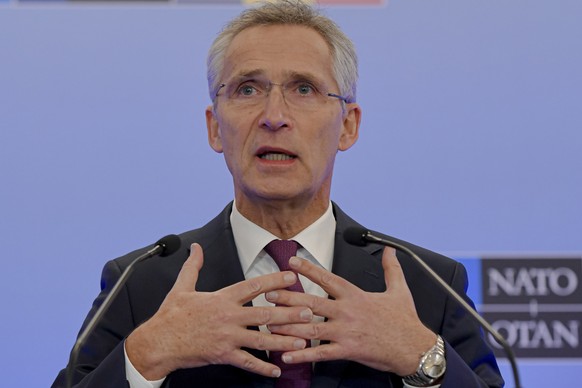 NATO Secretary-General Jens Stoltenberg gestures during a press conference in Bucharest, Romania, Wednesday, Nov. 30, 2022, on the last day of the meeting of NATO Ministers of Foreign Affairs. (AP Pho ...
