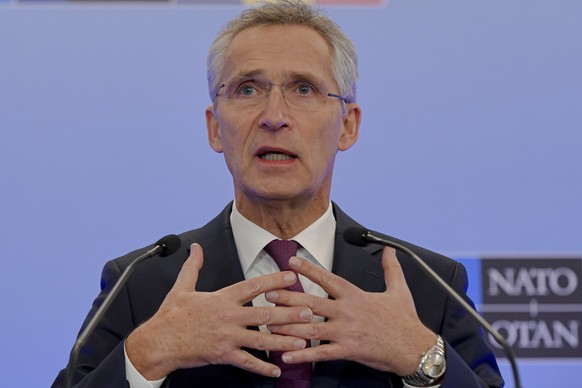 NATO Secretary General Jens Stoltenberg gestures during a press conference in Bucharest, Romania, Wednesday, November 30, 2022, on the last day of the meeting of NATO foreign ministers.  (AP photo...