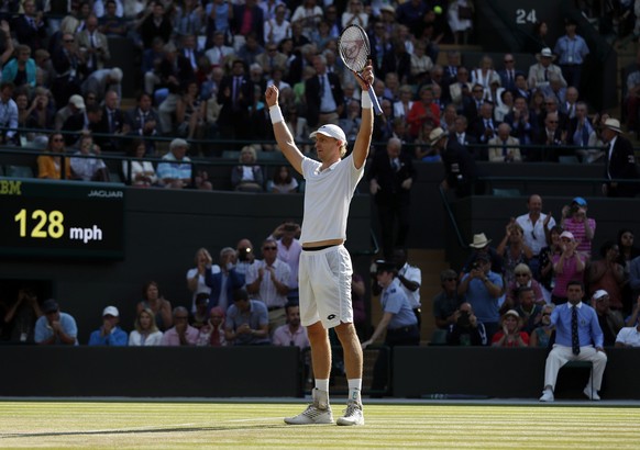 epa06880976 Kevin Anderson of South Africa celebrates his win over Roger Federer of Switzerland in their quarter final match during the Wimbledon Championships at the All England Lawn Tennis Club, in  ...