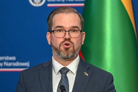 epa12652972 Lithuanian Defence Minister Robertas Kaunas attends a press conference after his meeting with Polish Defence Minister Wladyslaw Kosiniak-Kamysz(not pictured) at the Ministry of National De ...