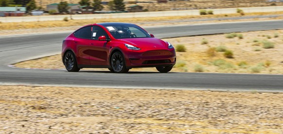 This photo provided by Edmunds, shows the 2023 Tesla Model Y Performance, a compact SUV with acceleration that can rival a number of dedicated sports cars. (Rex Tokeshi-Torres/Edmunds via AP)