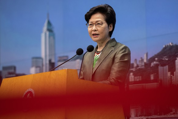 epa09324899 Hong Kong Chief Executive Carrie Lam speaks during a press conference at the Central Government Offices in Hong Kong, China, 06 July 2021. Carrie Lam is a new entry among the heads of stat ...