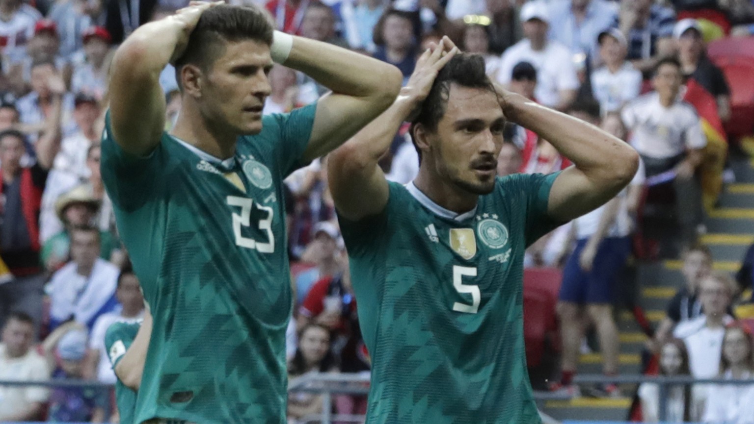 Germany&#039;s Mario Gomez, left, and Germany&#039;s Mats Hummels, right, hold their heads after failing to score during the group F match between South Korea and Germany, at the 2018 soccer World Cup ...