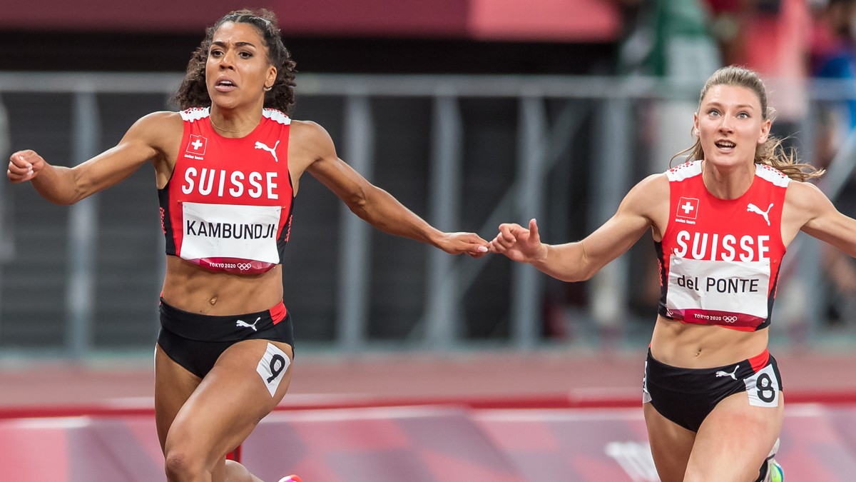 Ajla Del Ponte, right, and Mujinga Kambundji, left, finish the final of the women's 100 m in ranks five (Del Ponte) and six (Kambundji) at the 2020 Tokyo Summer Olympics Games in Tokyo, Japan, on ...