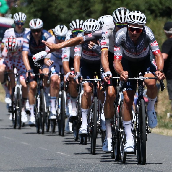 epa12231676 Swiss rider Silvan Dillier (R) of Alpecin - Deceuninck pulls the peloton during the 7th stage of the Tour de France cycling race over 197km from Saint Malo to Mur-de-Bretagne, France, 11 J ...