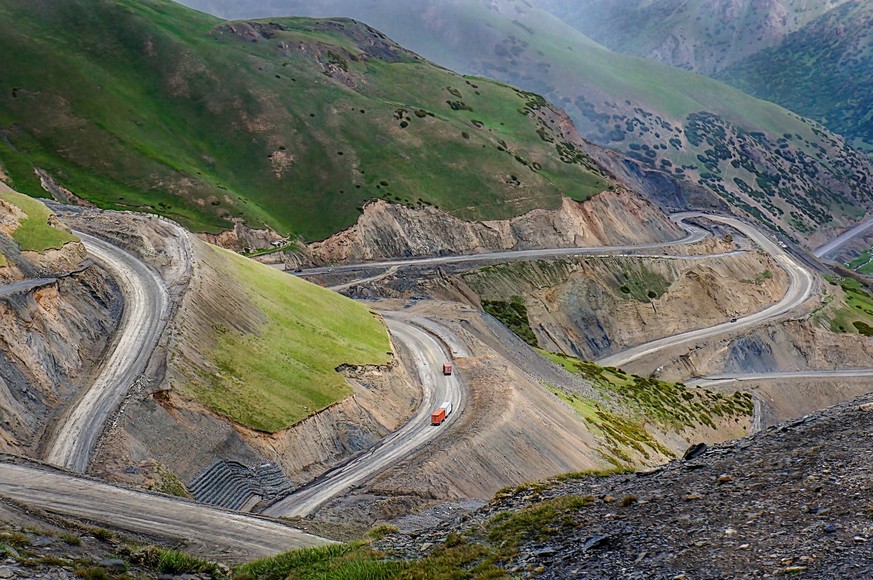 Steep slope of Pamir Highway (M41 Highway) at Sary-Tash in Alay valley, Osh region, southern Kyrgyzstan, near Tajikistan border.