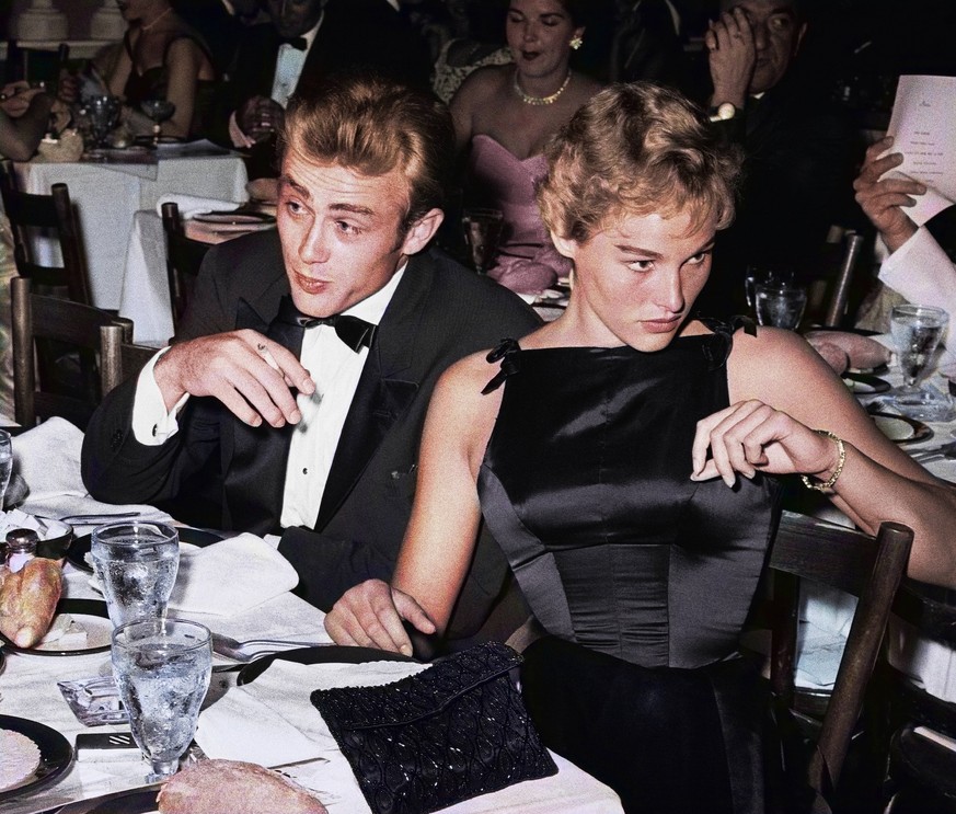 1955: James Dean and Ursula Andress at Oscar Dinner Great candid capture by celebrity photographer Frank Worth of Hollywood stars Ursula Andress and James Dean at the Oscars dinner. James Dean was an  ...