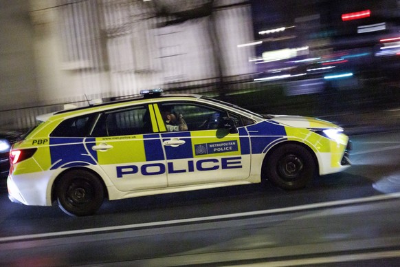 epa12644987 London Metropolitan Police officers patrol outside Houses of Parliament in Westminster, London, Britain, 12 January 2026. According to the Met's figures released on 12 January, there  ...