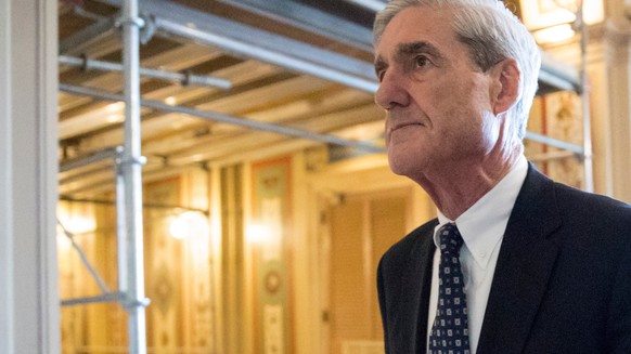 FILE - In this June 21, 2017, file photo, special counsel Robert Mueller departs after a meeting on Capitol Hill in Washington. Mueller’s team considers President Donald Trump a subject, not a crimina ...