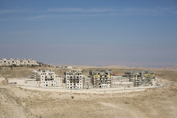 epa05741707 General view of a construction site of a new residential neighborhood at the Jewish settlement of Male Adumim, near Jerusalem, 22 January 2017. Israeli media reports state that right-wing  ...
