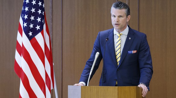 epa11998433 US Secretary of Defense Pete Hegseth speaks during a joint news conference with Japan&#039;s Defense Minister Gen Nakatani (not pictured) at the Ministry of Defense in Tokyo, Japan, 30 Mar ...