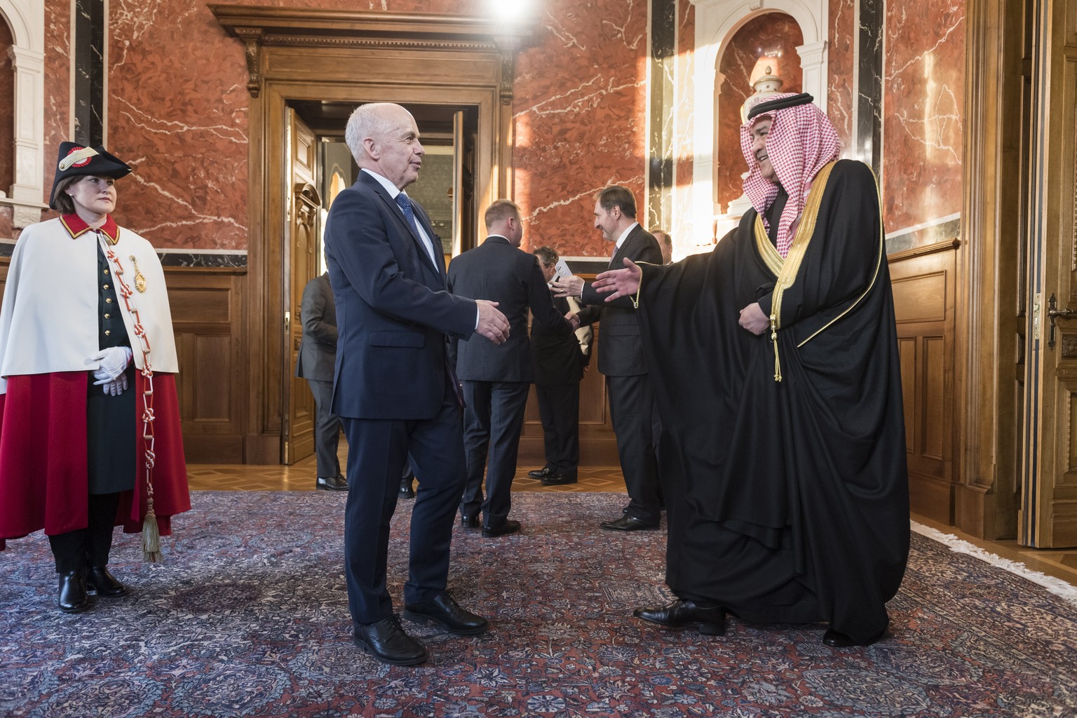 epa07290353 Swiss president Ueli Maurer (L), greets greets Hisham Alqahtani, ambassador of Saudi Arabia, during the traditional New Year&#039;s reception of the diplomatic corps in the Federal palace  ...