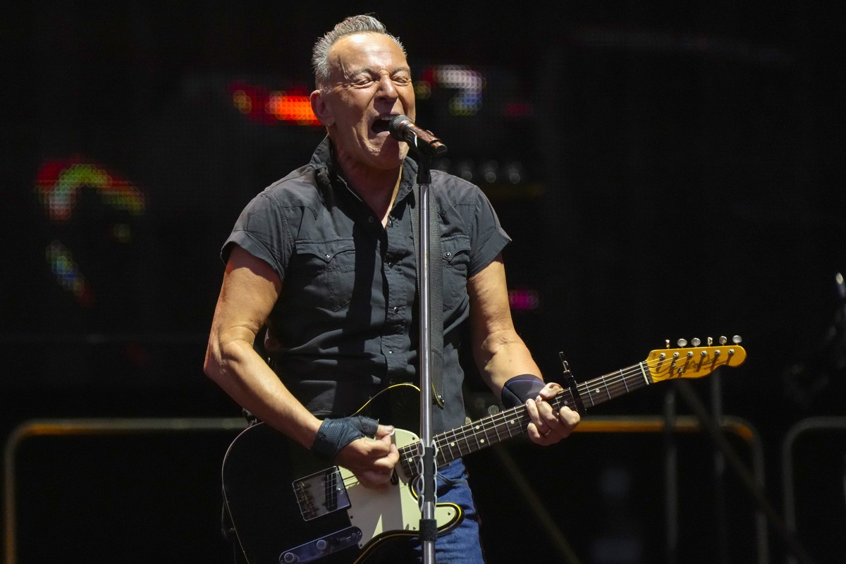 FILE - Bruce Springsteen and the E Street Band perform on Wednesday, Aug. 9, 2023, at Wrigley Field in Chicago. On Thursday, Sept. 7, 2023, Springsteen announced that he's postponing a series of  ...