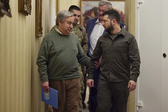 In this image provided by the Ukrainian Presidential Press Office, Ukrainian President Volodymyr Zelenskyy, right, and U.N. Secretary-General Antonio Guterres leave a news conference during their meet ...